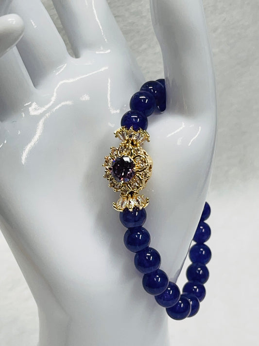 Purple Amethyst bracelet with purple and gold rhinestone flower charm